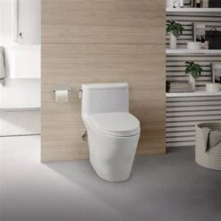 TOTO Nexus Cotton White Watersense Labelled Single Flush Elongated Universal Height 12-in Rough-in Toilet